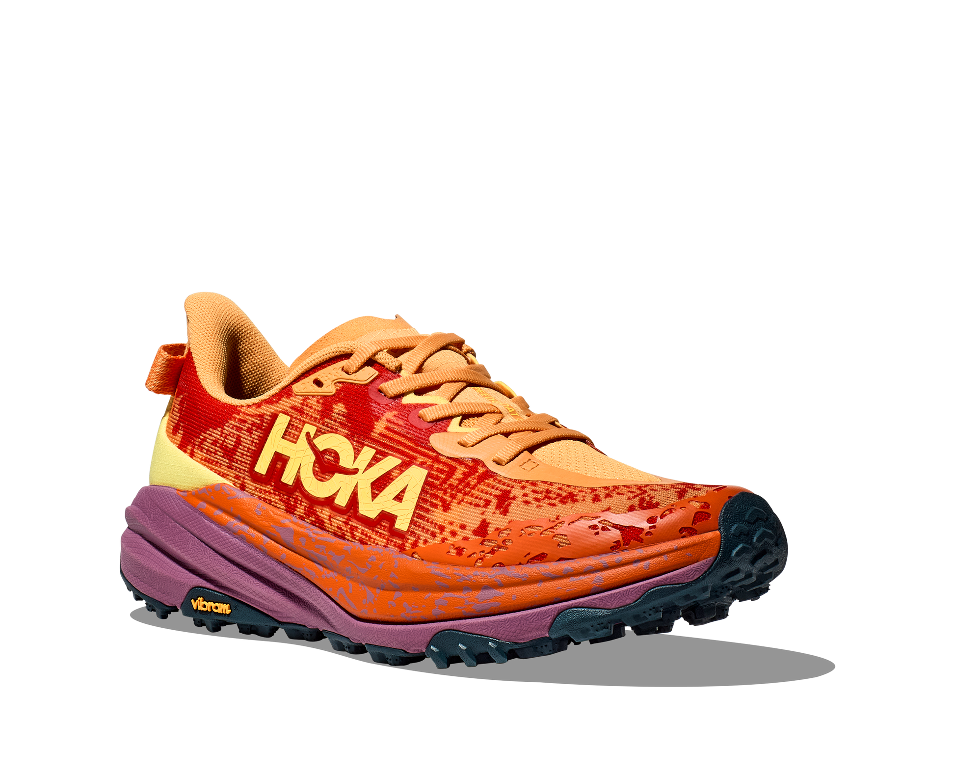 Hoka M Speedgoat 6. Terrängsko med dämpning och stabilitet. Vibram i dobbar. Färg orange och gul