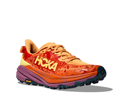 Hoka M Speedgoat 6. Terrängsko med dämpning och stabilitet. Vibram i dobbar. Färg orange och gul